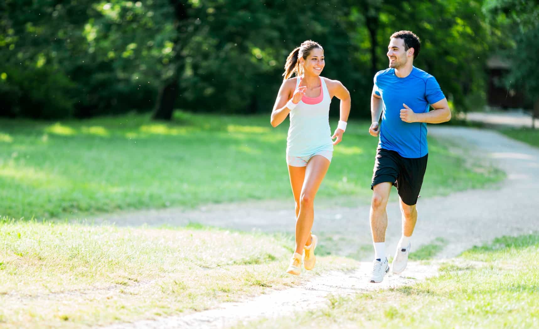 Young people jogging and exercising in nature
